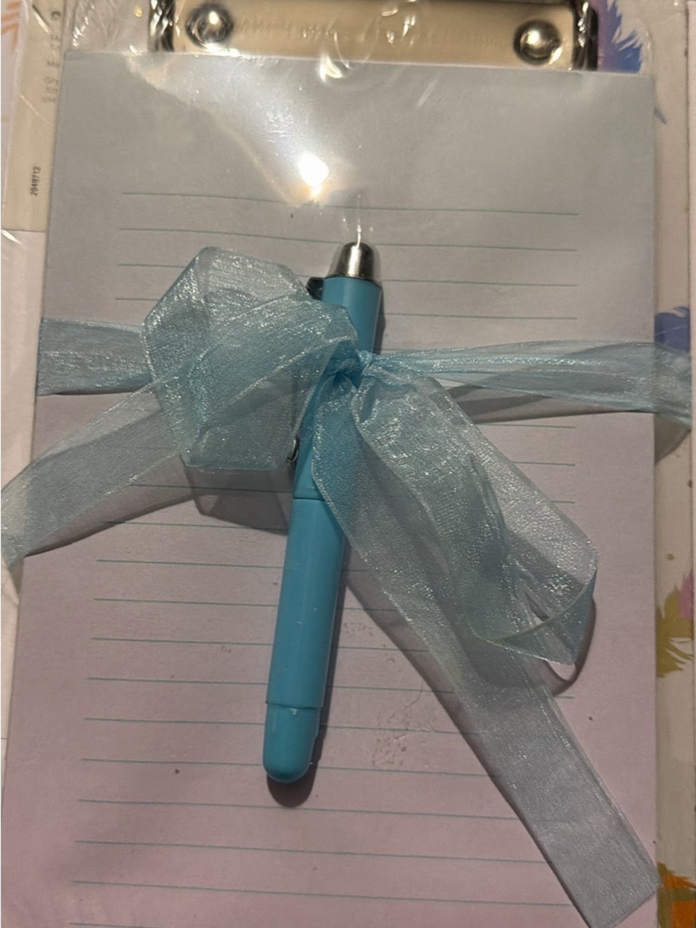 Feather Light Blue Ballpoint Pen and Ribbon Notepad and Clipboard